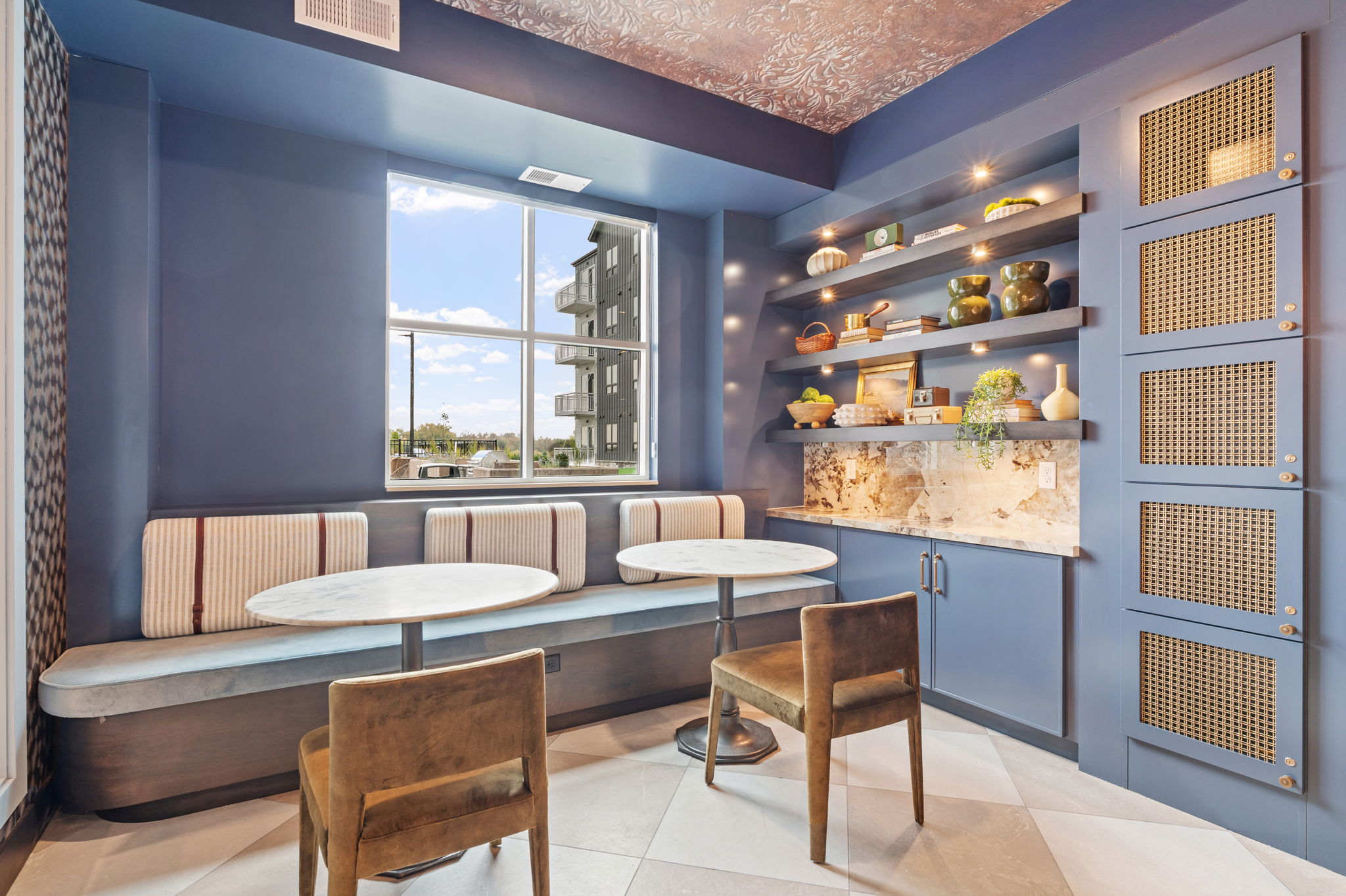 Whiskey parlor room with seating and view of pool