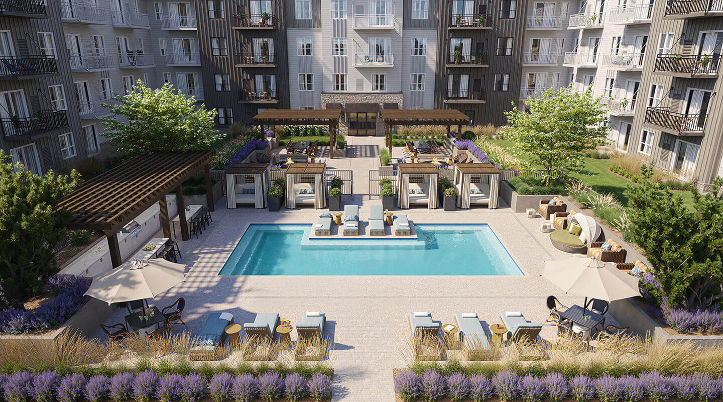 Rye Apartments outdoor area featuring a pool and deck with lounge chairs, cabanas, and shaded seating areas